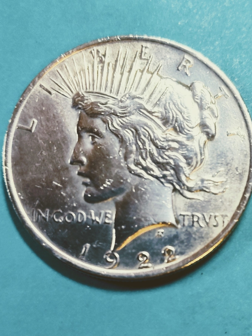 1922-P 90% Silver Coin  Peace Dollar In Good Circulated Condition.